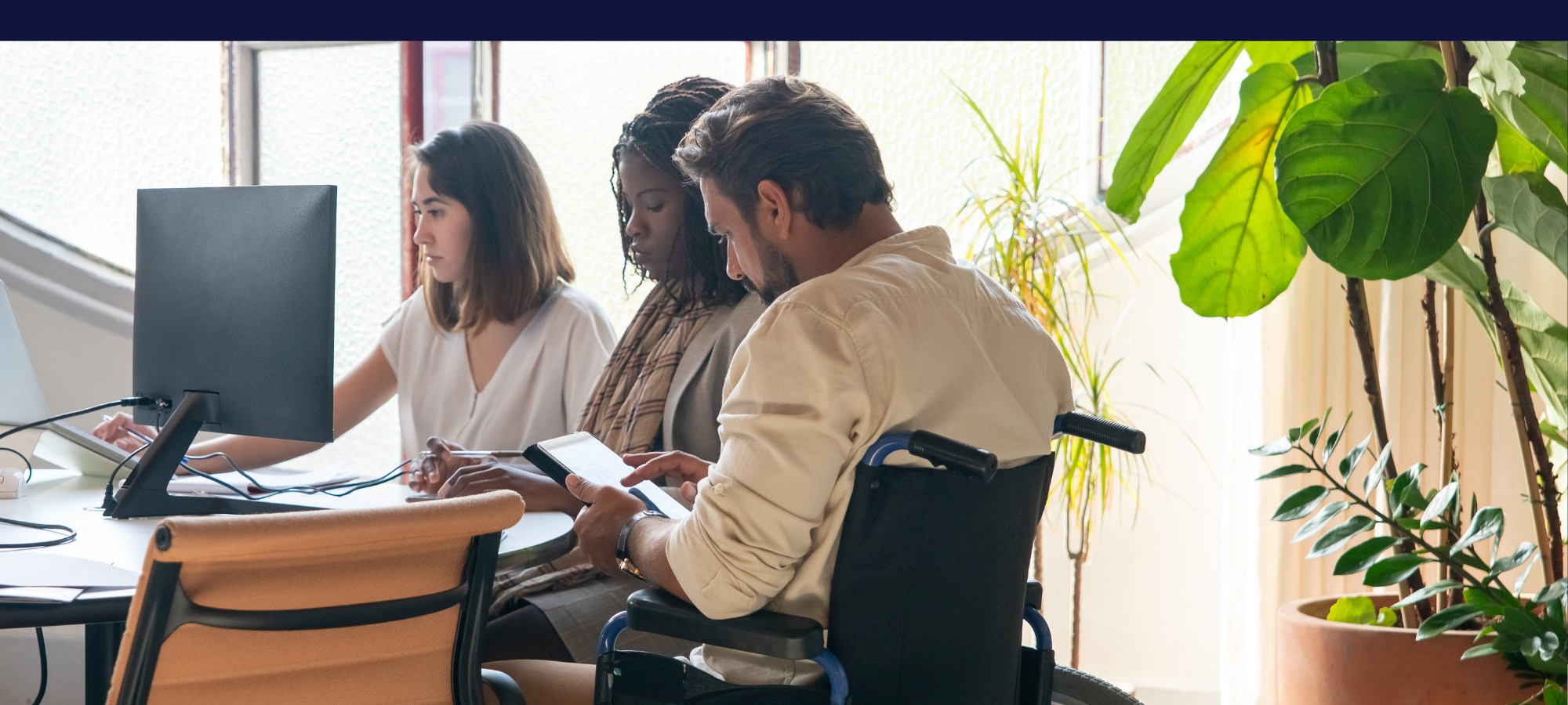 Image of a diverse team, symbolizing equal opportunities for individuals working with disabilities in the workplace. Image of a diverse team, symbolizing equal opportunities for individuals working with disabilities in the workplace.